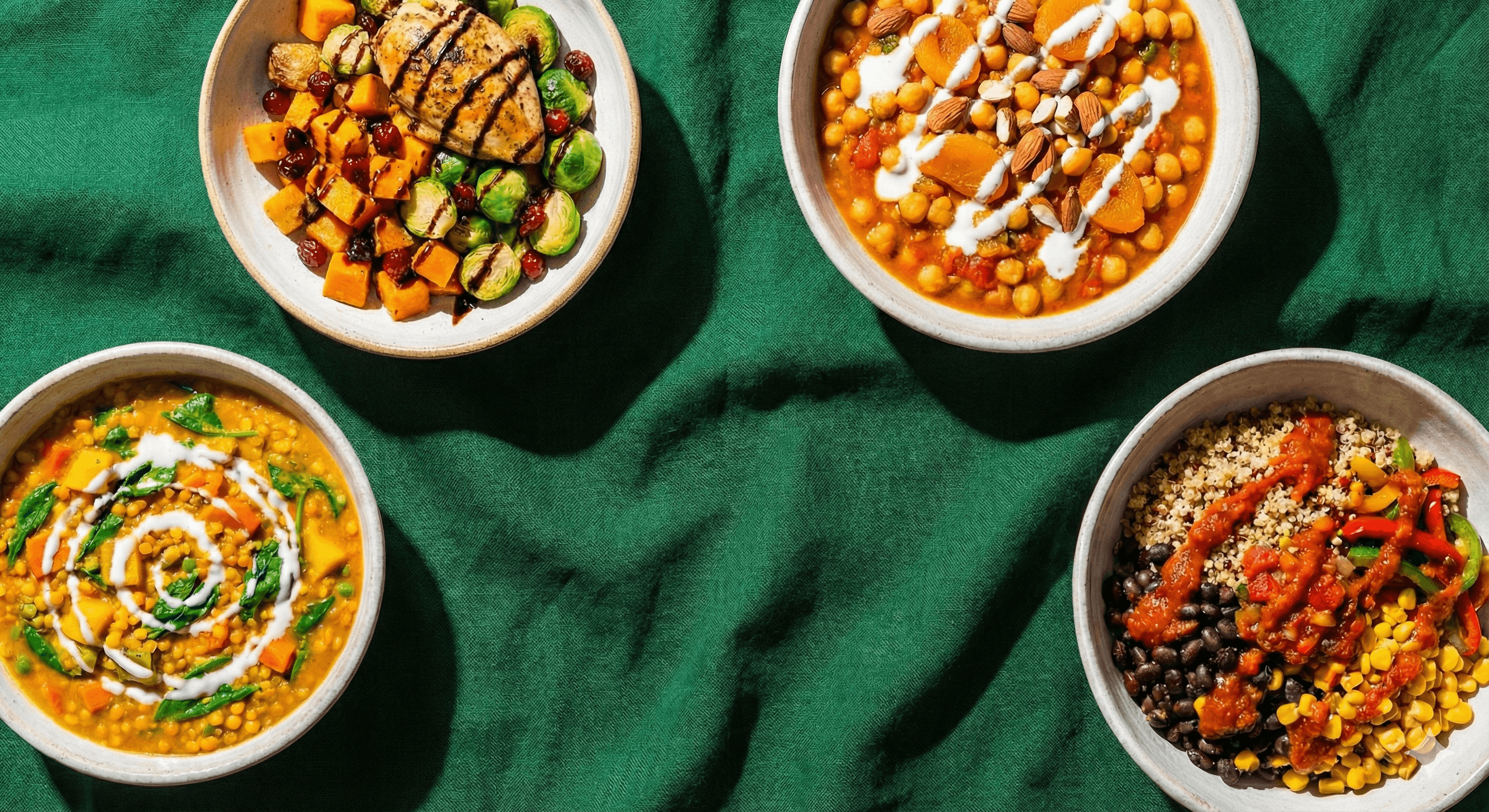 Chef-made meals on a stone table.